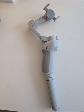 DJI Foldable Smartphone Gimbal Stabilizer - Light Gray and White